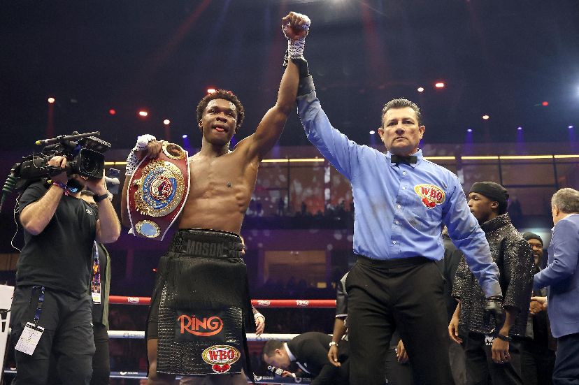 Mason Rallies Late to Stop Bell, Makes Dramatic First WBO Title Defense